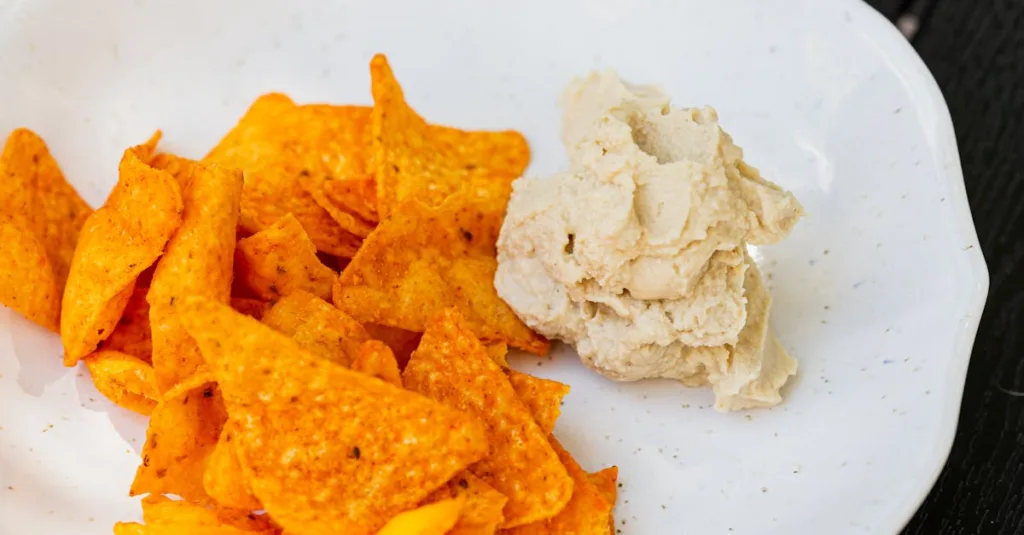 découvrez notre recette onctueuse de houmous crémeux, parfaite pour vos apéritifs et repas sains. facile à préparer et délicieusement savoureuse.